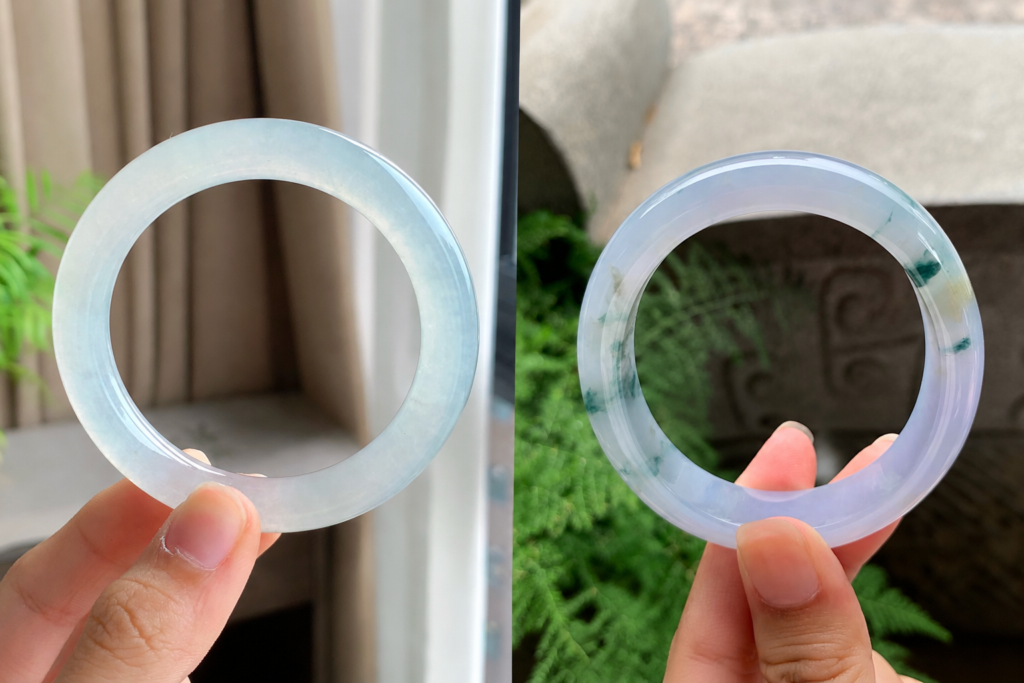 Guifei oval jade bangle beside a round jade bangle, showing the difference in opening shape